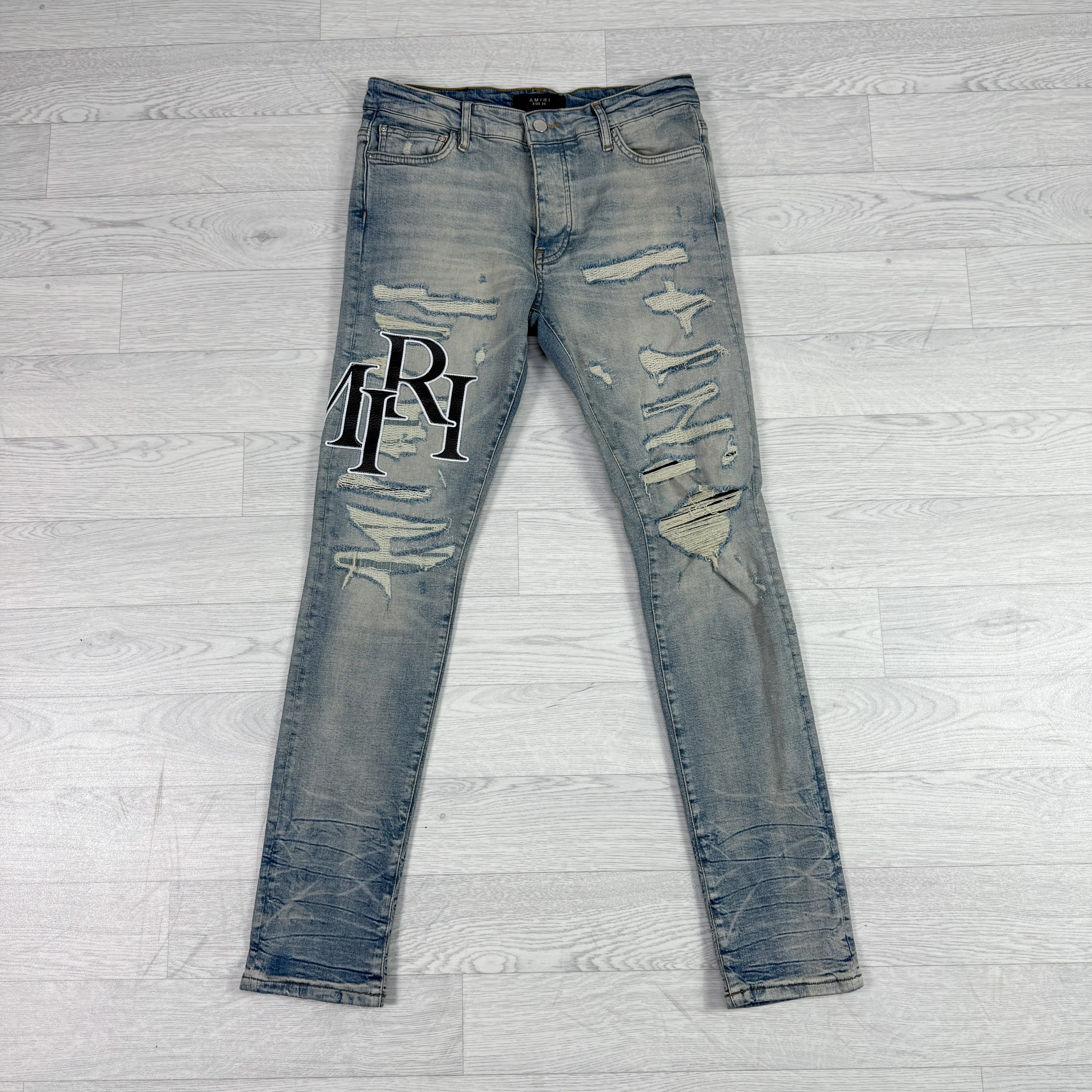 Leather Patch Logo Slim Fit Jeans