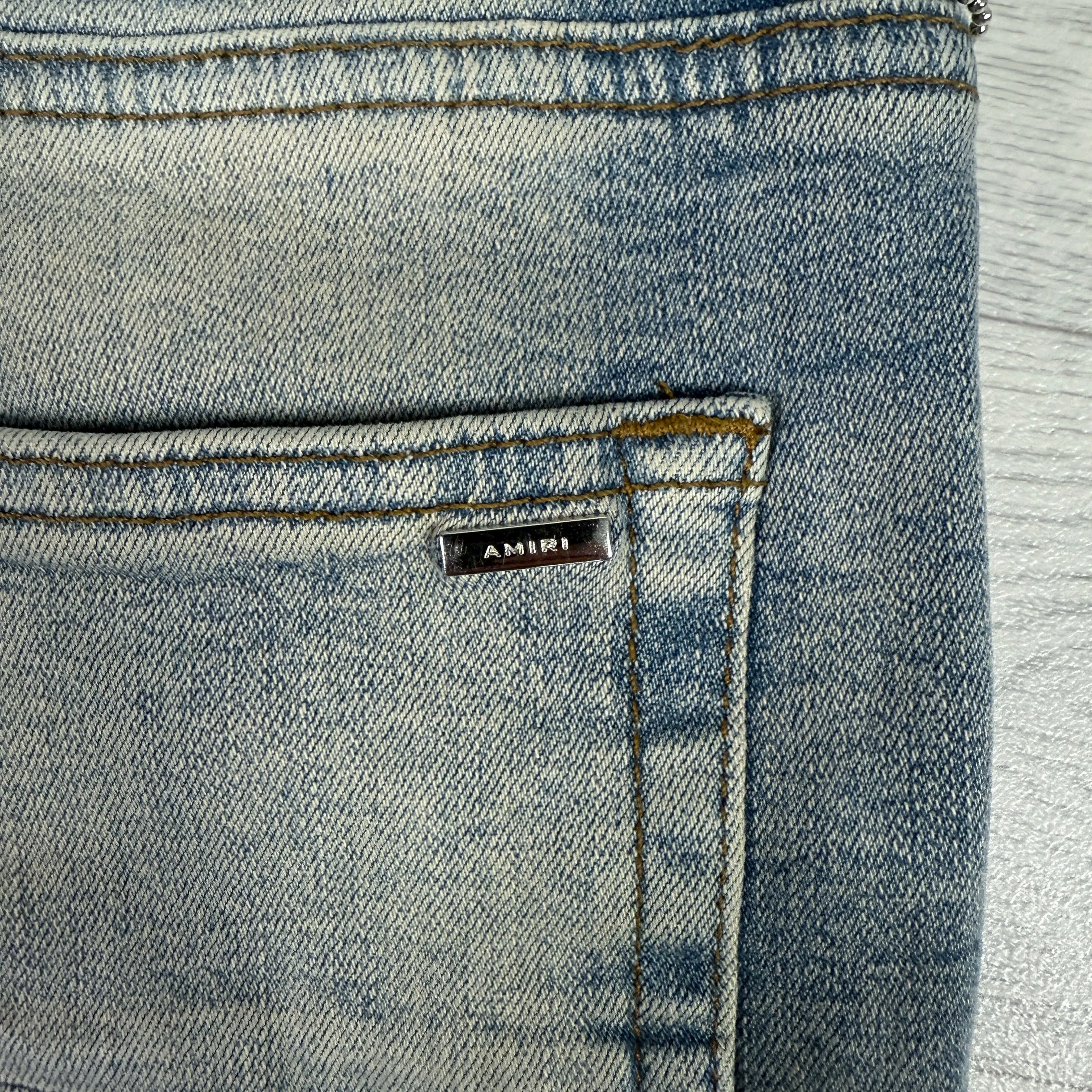 Leather Patch Logo Slim Fit Jeans