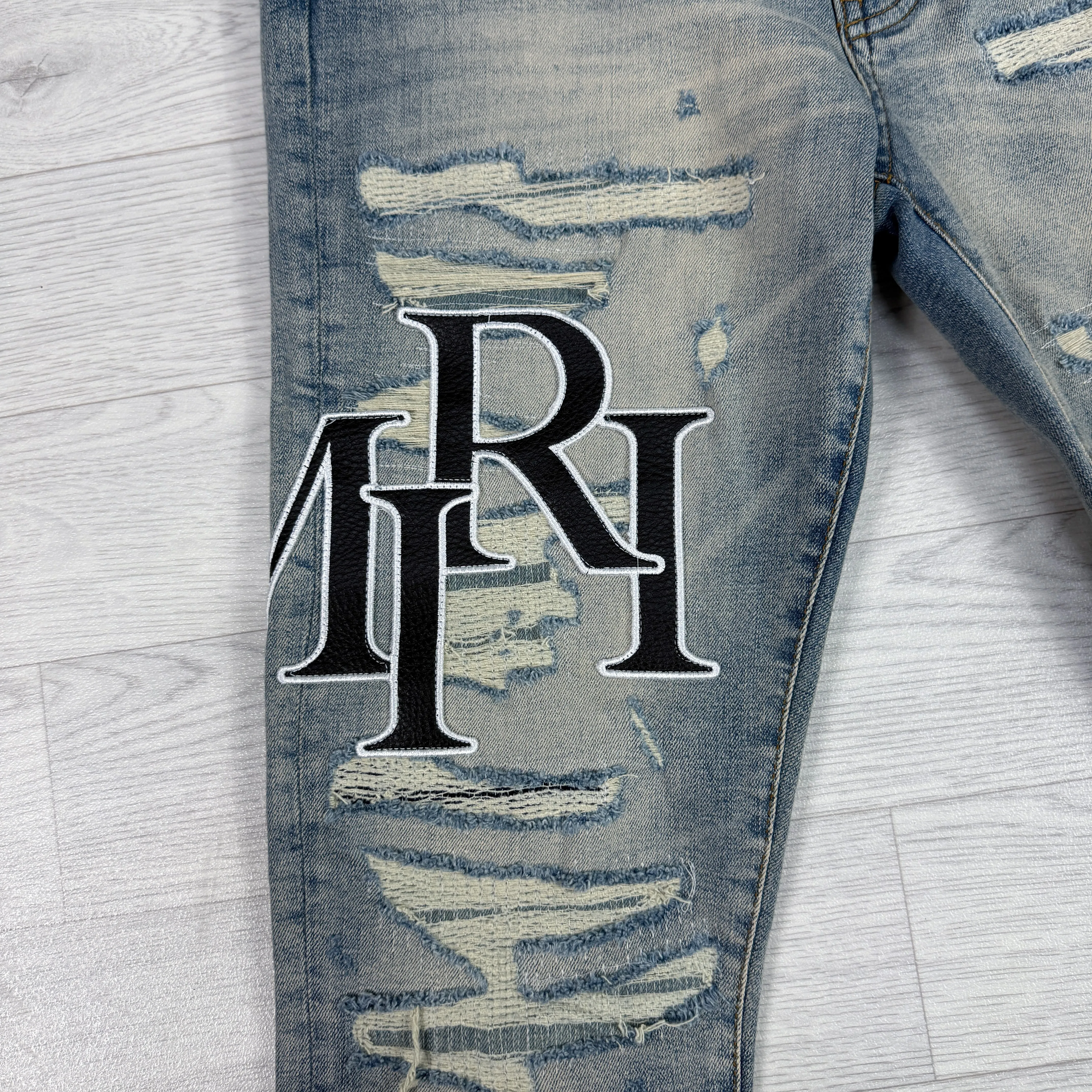 Leather Patch Logo Slim Fit Jeans